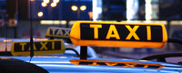 Taxischild auf PKW